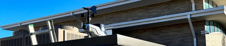 Headline image of a AcuRite Atlas Weather Sensor attached to a building