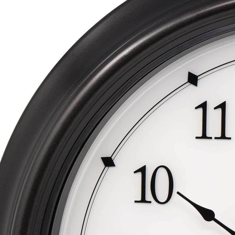 Close-up of AcuRite illuminated outdoor clock with temperature and humidity sensors