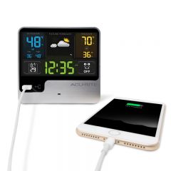 Alarm Clock with Weather Forecast charging a phone on the USB charger - AcuRite Clocks